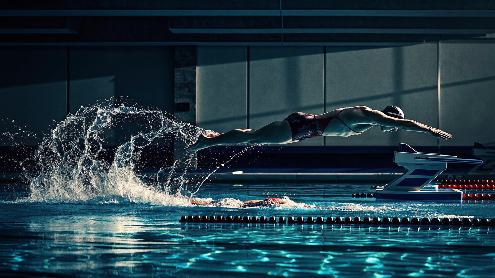 Competitive swimmer exploding off the starting block into a streamlined dive